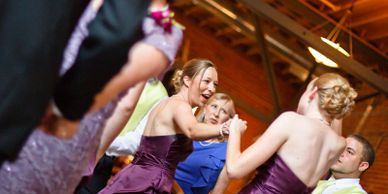 Bridesmaids dancing at the wedding reception.