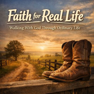 An image of cowboy boots on a fence beside an old dirt road.