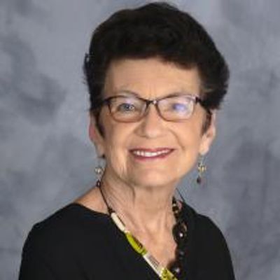 A picture of Dr. Dougherty, a board member and expert in child and adolescent health.