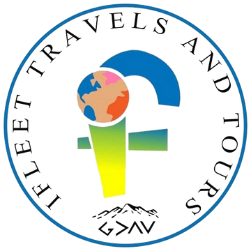 Logo for Telet Travels and Tours featuring a globe and stylized letters.