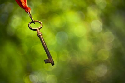 Antique key representing access, control and the transfer of a legacy