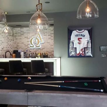 quartzite illuminated counter top faux brick wall wet bar basement renovation pool table pool room b