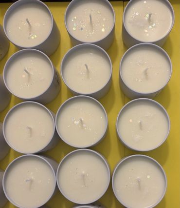 Our custom white candles feature a clean, elegant aesthetic with subtle shimmer and calming energy —