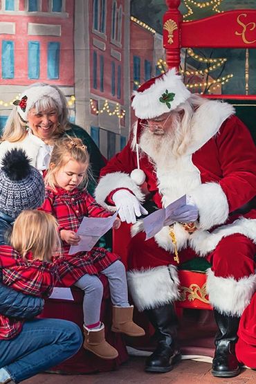 Mile High Santa Claus and Mrs. Claus visiting children; Boulder CO. St. Nick on the Bricks, 2022