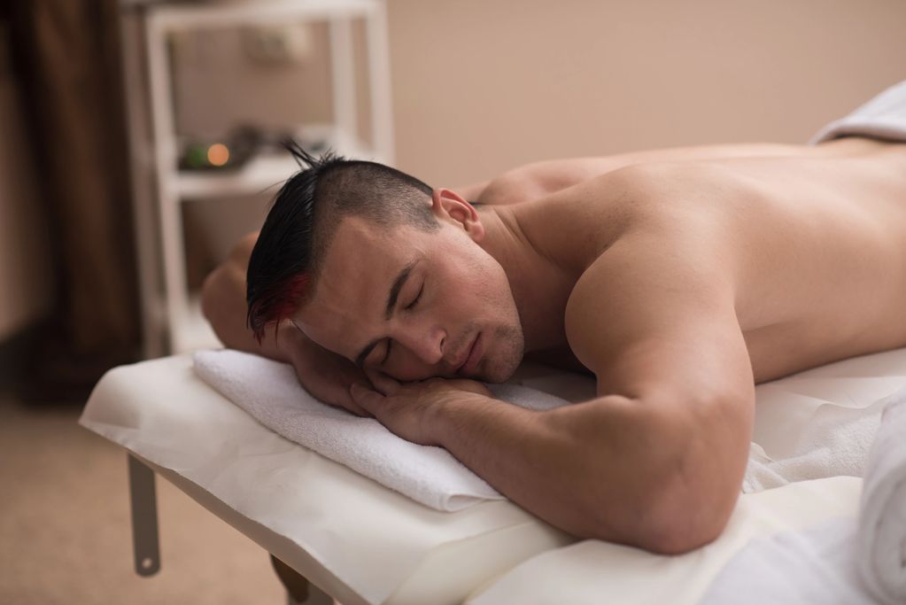 Man receiving gay tantric massage