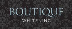 Elegant logo for Boutique Whitening with a dark floral background.