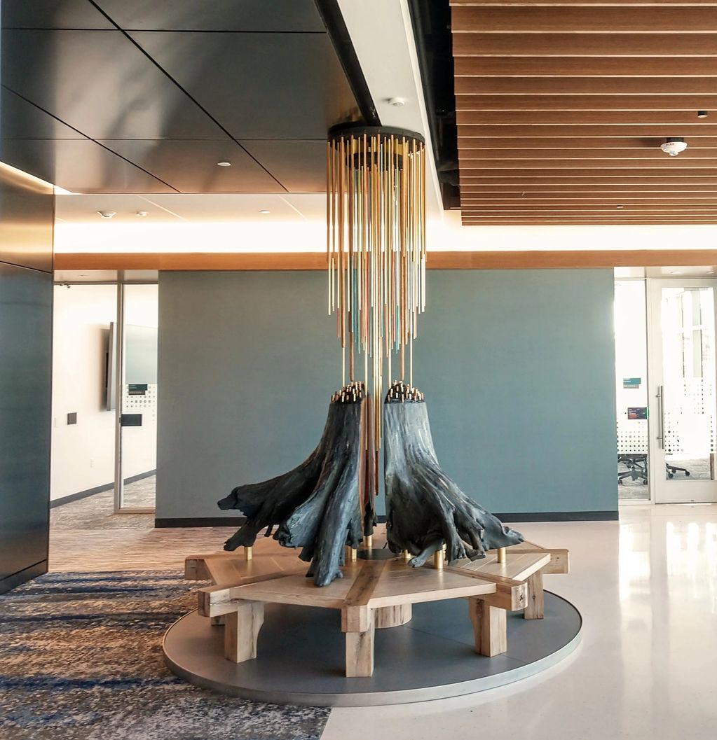 Sculpture incorporating tree stump and roots. Commissioned by  TruStage and located in headquarters,