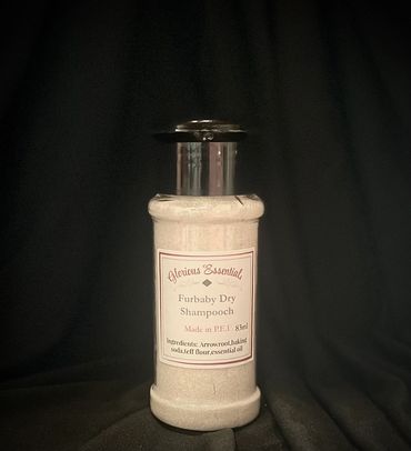 Bottle of Glorious Essentials Furbaby Dry Shampooch with natural ingredients.