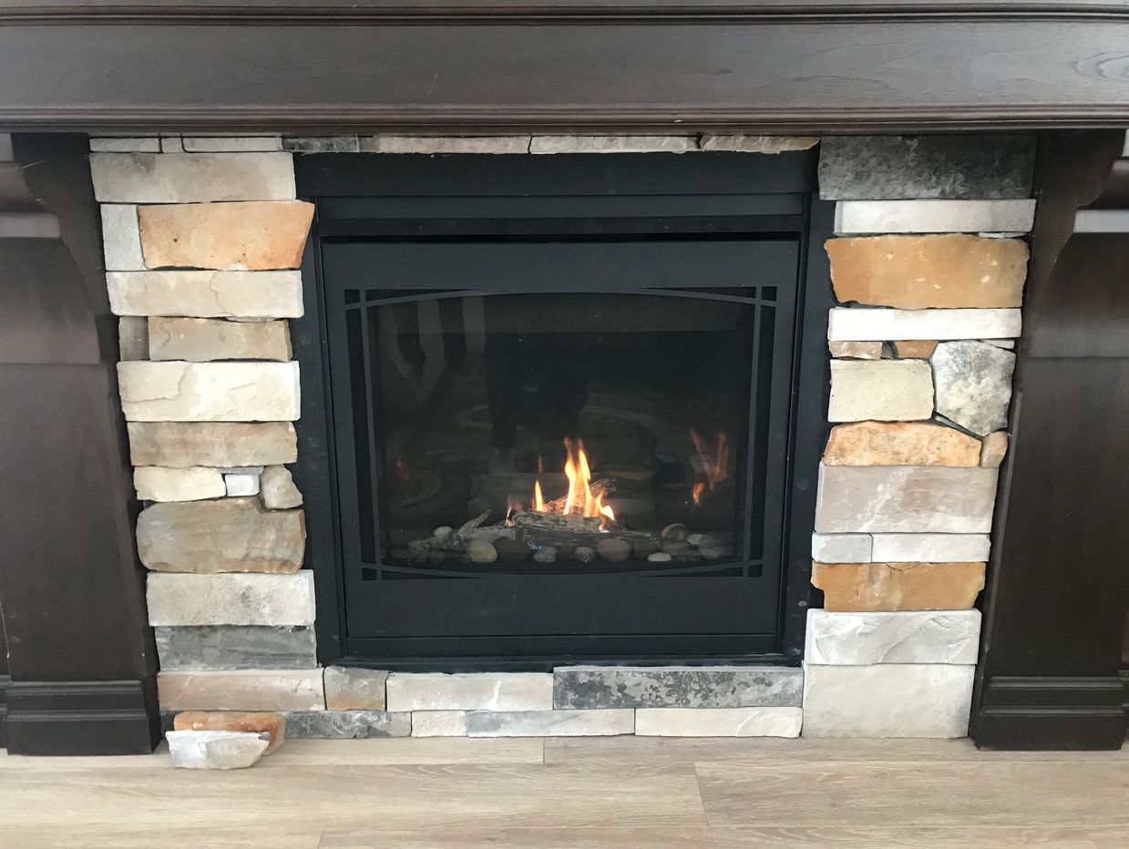Gas Fireplace Re & Re. Out with the old, in with the new!