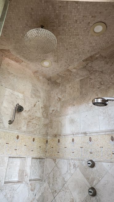 Travertine shower cleaned and sealed by Stone Master and Tile Care