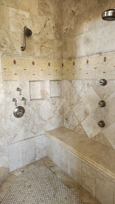 Travertine shower cleaned and sealed by Stone Master and Tile Care