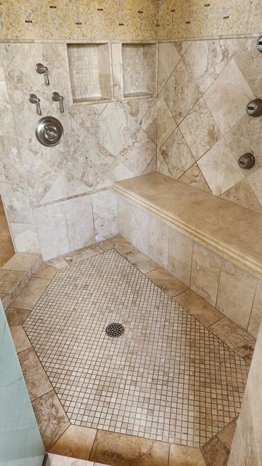 Travertine shower cleaned and sealed by Stone Master and Tile Care