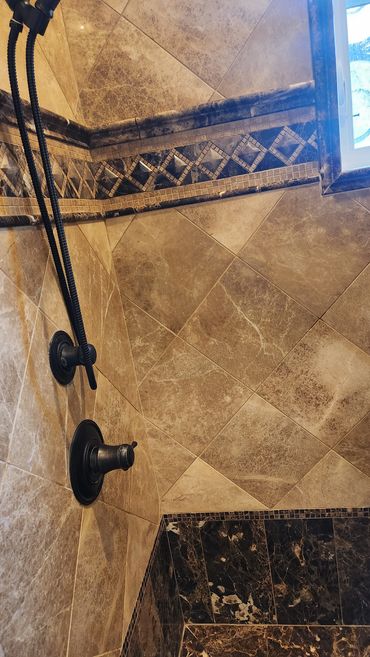 Travertine and Marble Shower cleaned and sealed by Stone Master and Tile Care