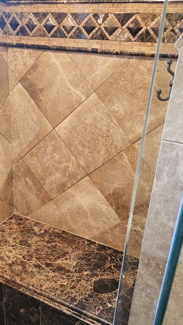 Travertine and Marble shower cleaned and sealed by Stone Master and Tile Care