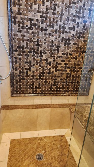 Travertine and Marble Shower cleaned and sealed by Stone Master and Tile Care