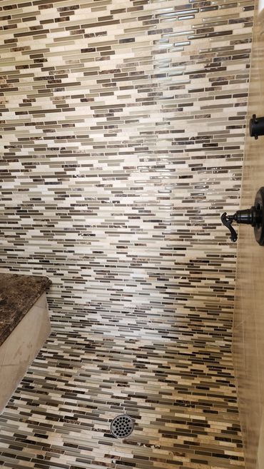 Travertine and Marble Shower cleaned and sealed by Stone Master and Tile Care