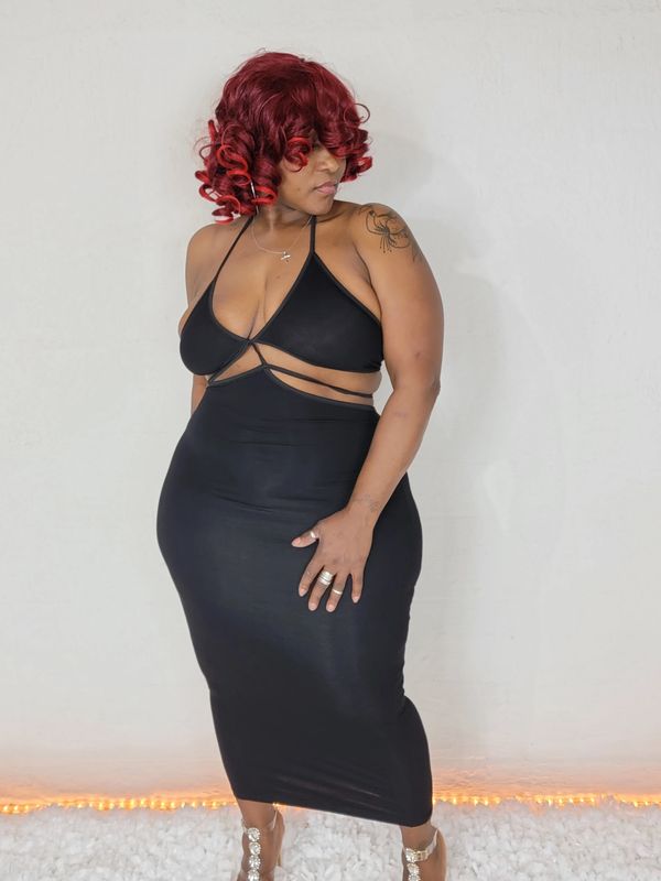 A woman wearing Melanie Set in Black Color