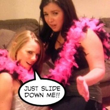 Bridesmaids with pink boas during bachelorette dance party saying just slide down me