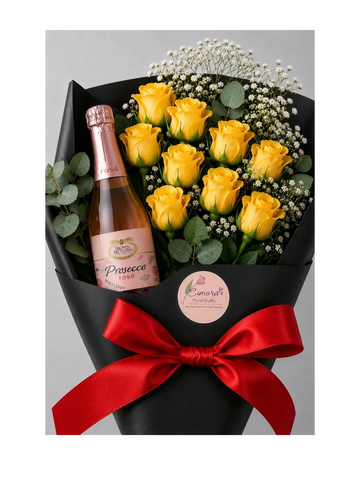 A bouquet of yellow roses with a mini bottle of Prosecco rosé, wrapped in black paper with a red ribbon.