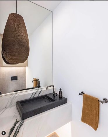 White Marble Amazon Stone Boutique with backsplash ledge and done by CSW counters