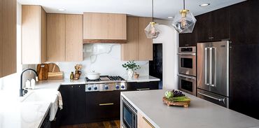 Calcatta Laza perimeter and Caesarstone island with waterfalls 1 1/2 miter edge CSW counters