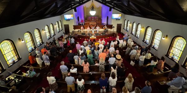 Congregation gathered inside a church during service.