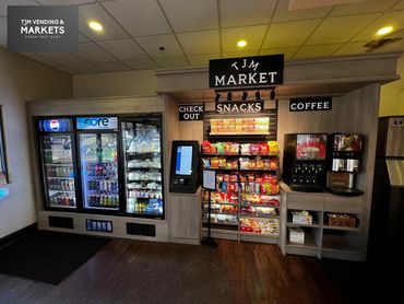 Custom micro market installed by TJM Vending featuring fresh food, snacks, beverages, coffee service