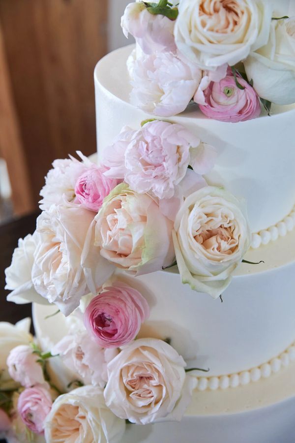 Wedding Inspiration for an upcoming novel. Real flowers on a white icing cake