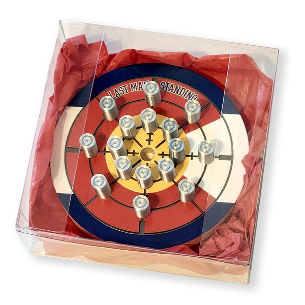 Mini dartboard with batteries arranged on it.