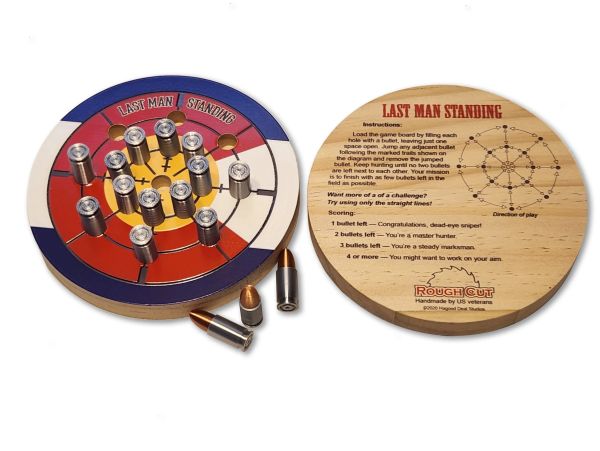 Wooden dartboard game named Last Man Standing with bullets as darts.