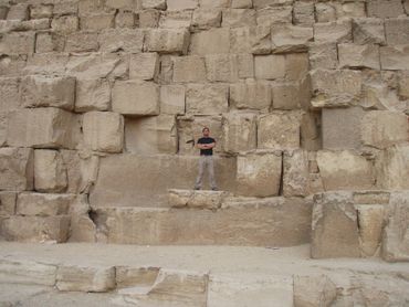 Bradley Williamson standing on the Great Pyramid of Giza.