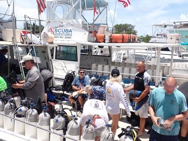 finding sunken treasure students on dive boat
