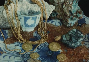 Gold Doubloons, gold chains, Kang Hsi porcelain and silver Pieces of Eight