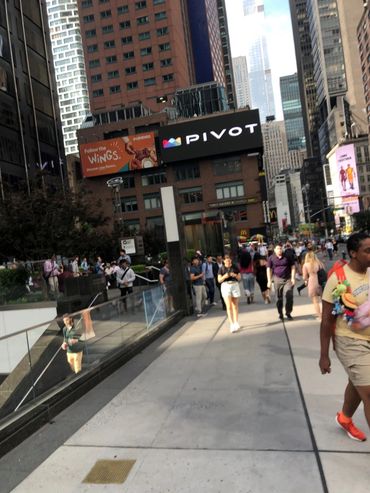 The crowds of people in Manhattan.