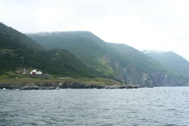 coastline in Canada with old abandoned lighthouse.