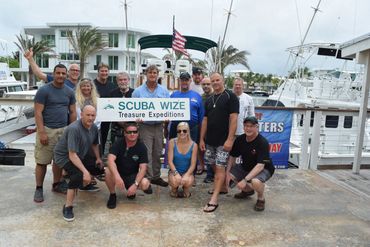 Group of students from finding sunken treasure class after diving on sunken treasure sites