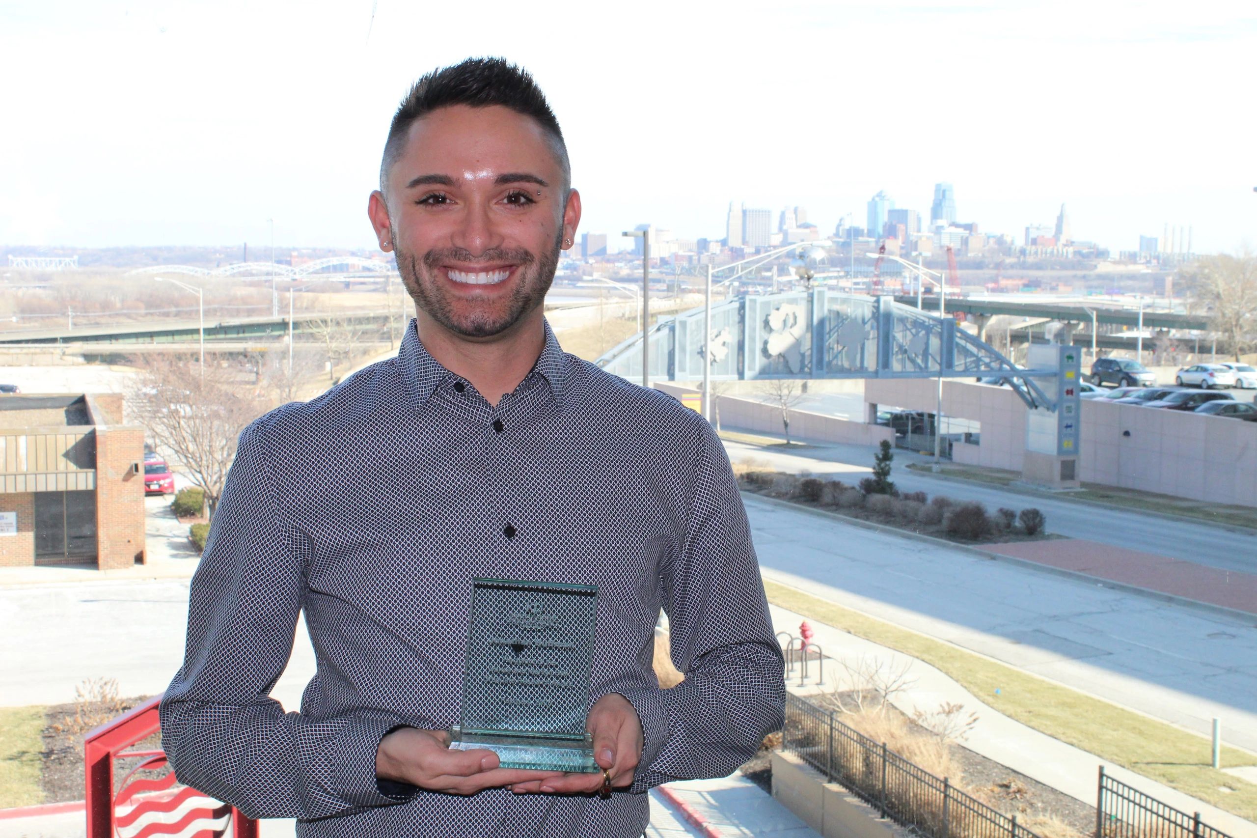 Dr. Jonathan Huffman with Award in Kansas City, Kansas.