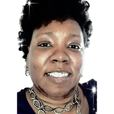 Smiling woman with a necklace and digital sparkle effects.