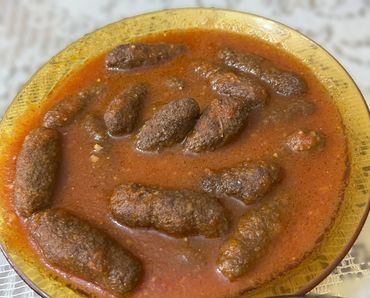 Dawood Basha! kofta shaped meatballs in rich tomato sauce