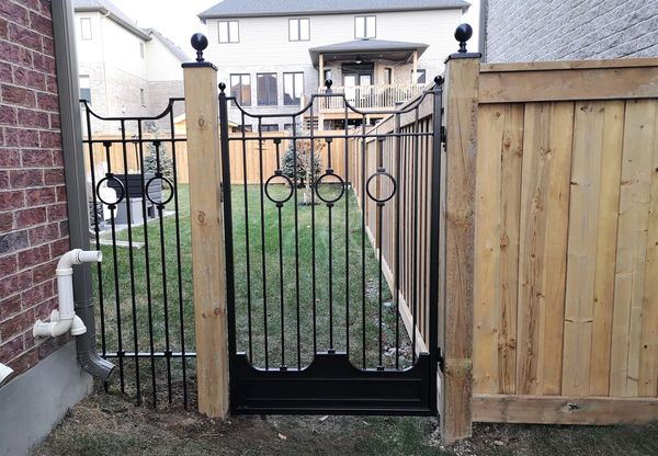 red iron design custom metalwork metal work iron work garden gate artistic unique designs formal