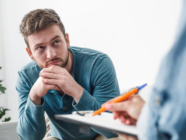 Man attentively participating in therapy