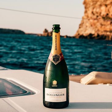a bottle of Bollinger champagne on private boat at sea