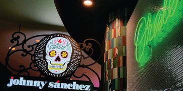 Caesars NO = interior retail restaurant sign  custom wrought iron accents w/ lit acrylic push thru