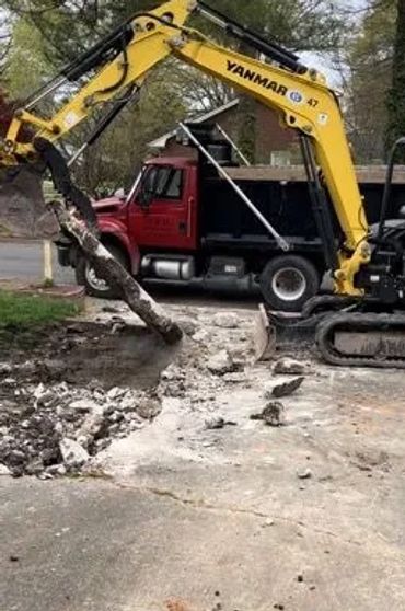 removal of concrete driveway.