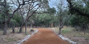 granite gravel driveway with live edge limestone edging