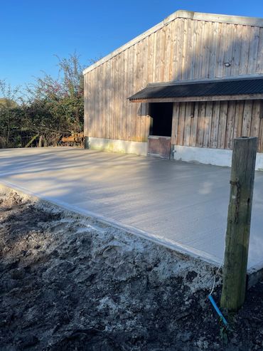 Concrete pad for horse stables