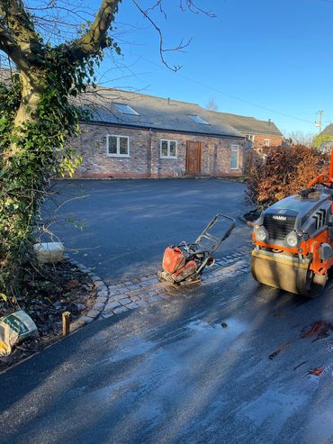 Tarmac and cobbled border