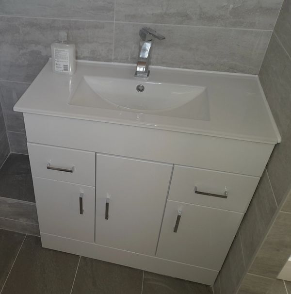 Kennedy plumbing services vanity basin unit with new basin tap 