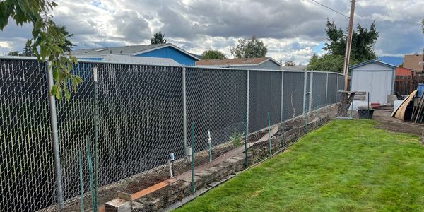 Chain link fence with privacy slats in Sutherlin, Oregon