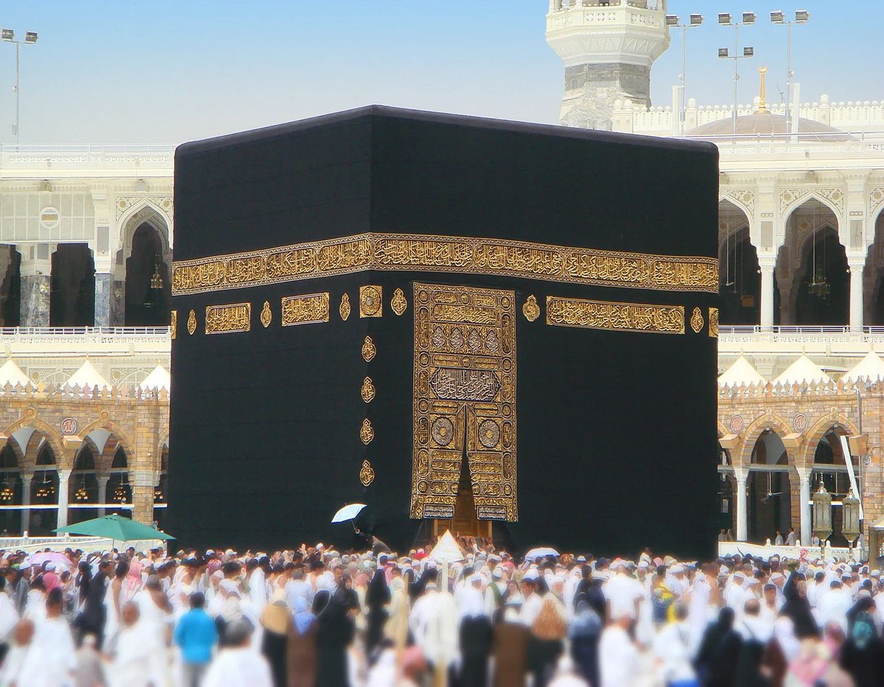 Crowd of pilgrims around the Kaaba in Mecca during Umrah. The crowd includes people of all backgrounds, including reverts & converts to the faith!